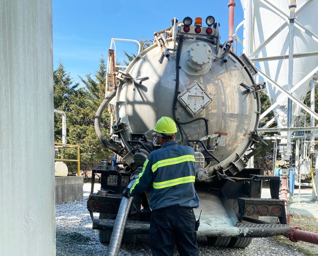ace employee wearing safety equipment on job