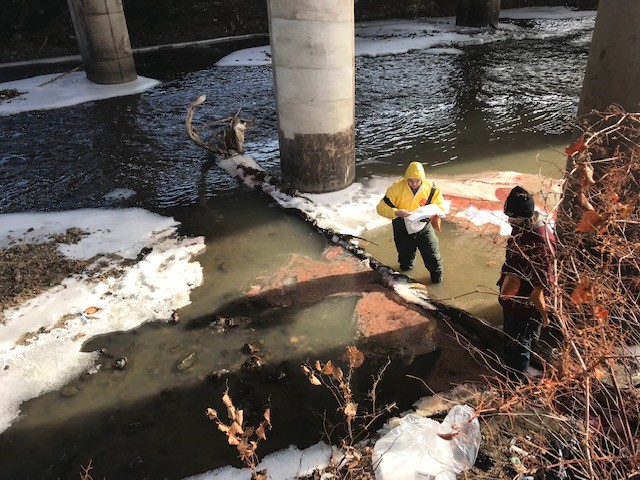 Miller Environmental Group employees responding for an oil spill cleanup