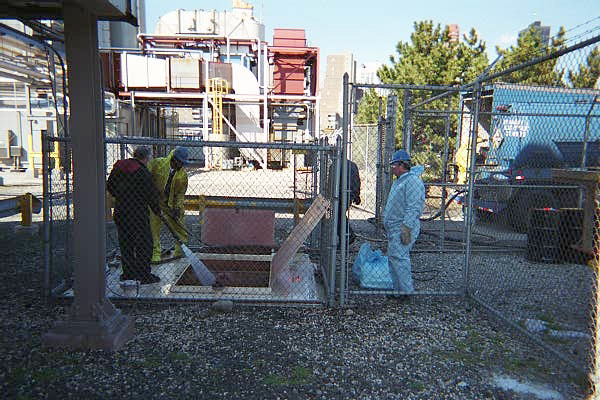 Miller Environmental experts performing industrial cleaning services