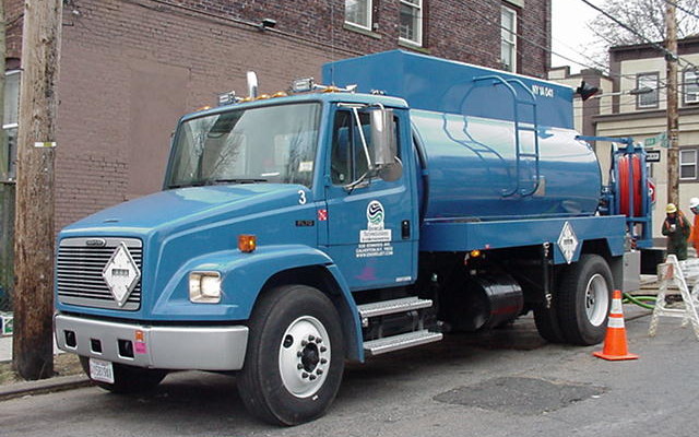 A Miller Environmental truck on site for hazardous waste pickup